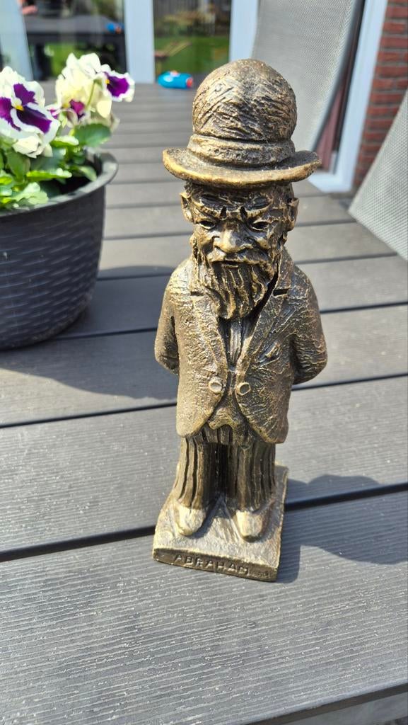 Bronzen beeldje Abraham, Ophalen