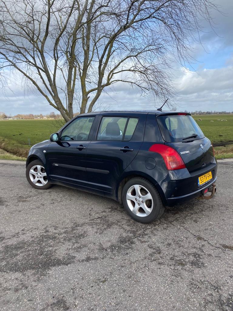 Suzuki Swift 1.3 5DRS 2007 Zwart, Auto's, Voorwielaandrijving, Stof, 40 €/maand, Zwart