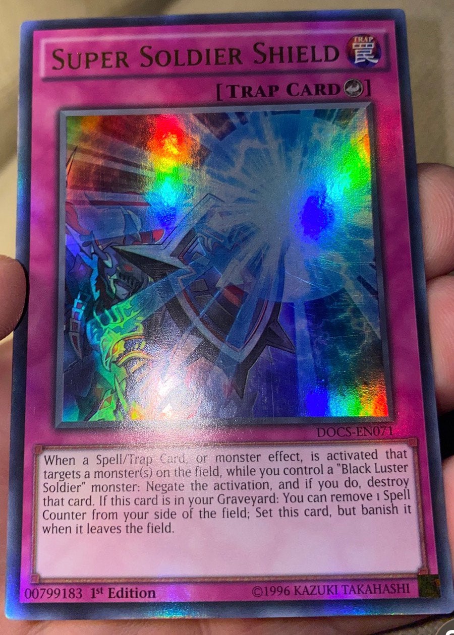 Yu-Gi-Oh! Super Soldier Shield DOCS 1st Edition !, Ophalen of Verzenden, Zo goed als nieuw, Losse kaart, Foil