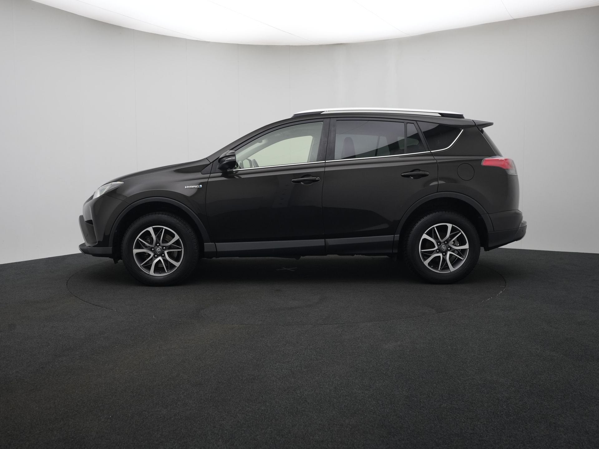 Toyota RAV4 2.5 Hybrid Executive Business (bj 2016), 12 maanden, Gebruikt, Zwart, Bedrijf
