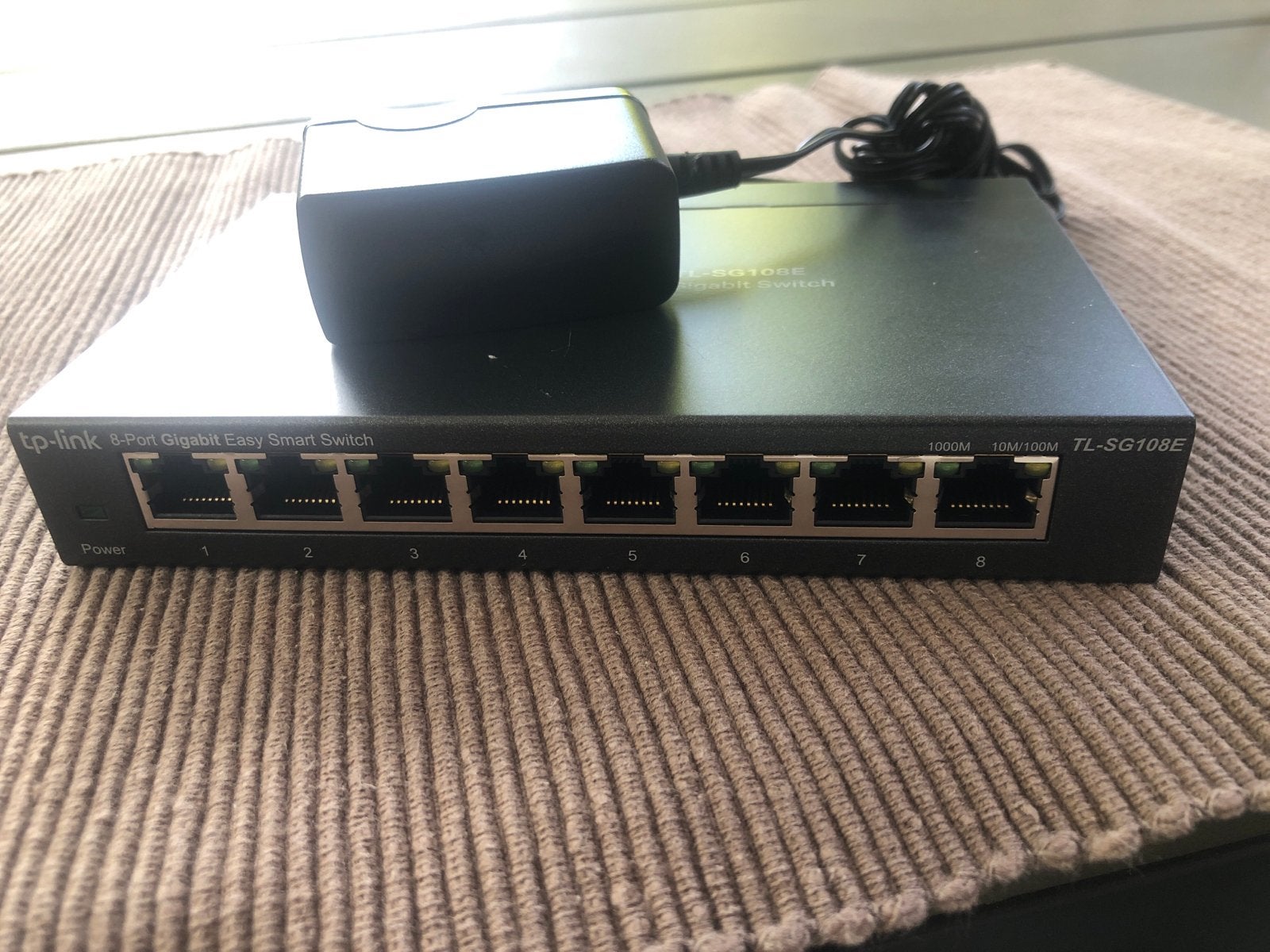 TP-Link TL-SG108E 8-Poorts Gigabit Easy Smart Switch, Ophalen of Verzenden, Zo goed als nieuw
