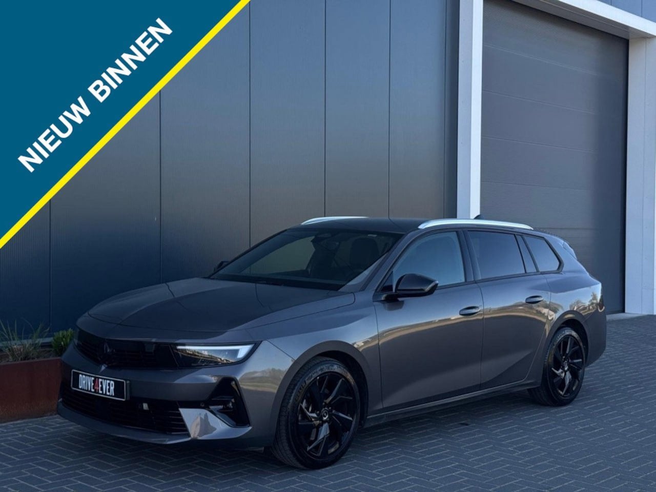 Opel Astra Sports Tourer, Auto's, Opel, Automaat, Dealer onderhouden, Gebruikt, Zwart