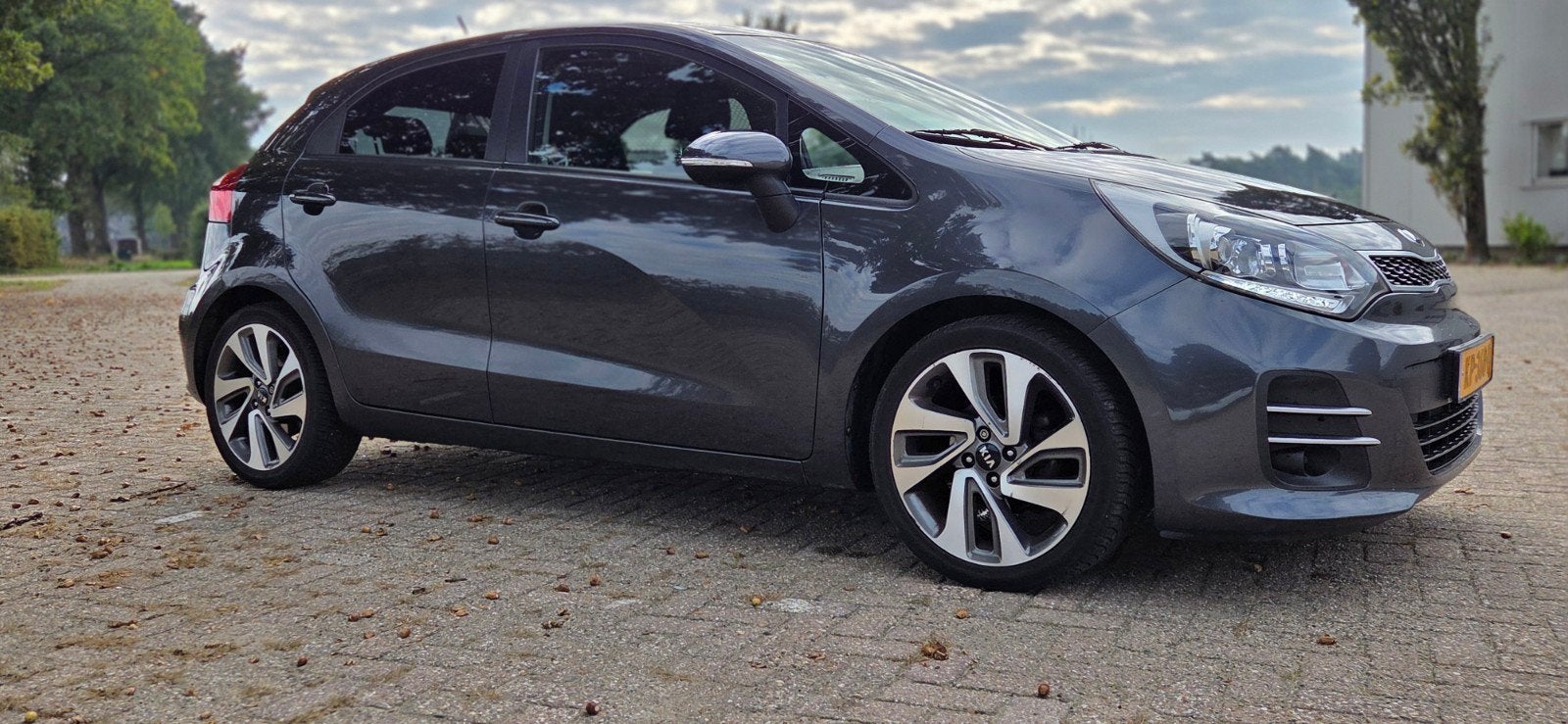 Kia Rio 1.2 I 5DRS 2016 Grijs, Auto's, 40 €/maand, 4 cilinders, Bluetooth, Origineel Nederlands