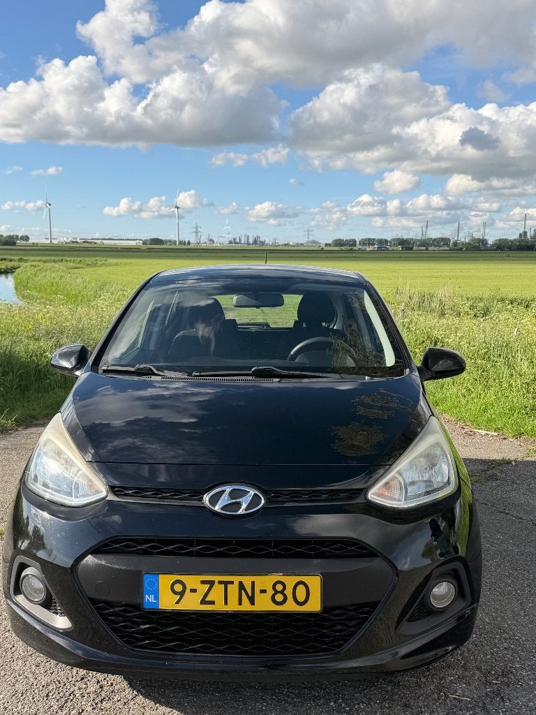 Hyundai i10 1.0 5DR 2015 Negro, Auto's, Voorwielaandrijving, Stof, 31 €/maand, 4 stoelen