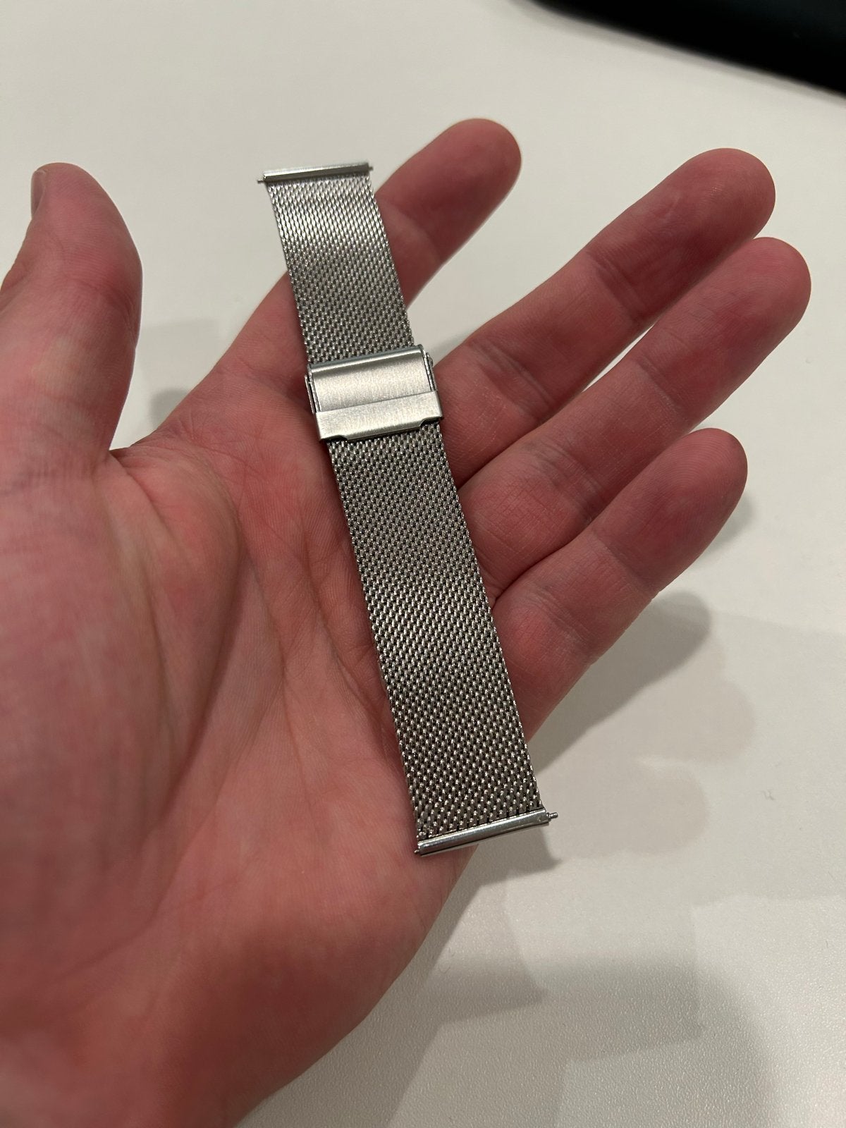 Roestvrijstalen nieuwe Milanese horlogebandje, 21 mm breed, Ophalen of Verzenden, Zo goed als nieuw