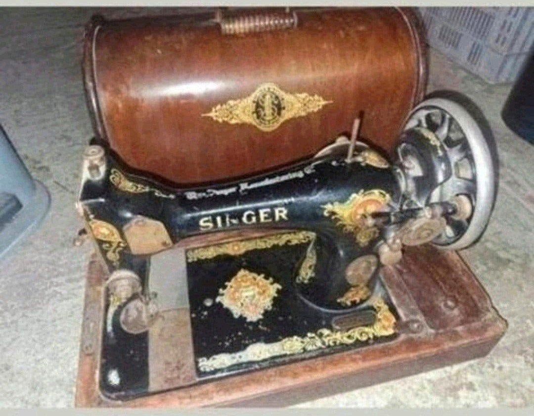 singer naaimachine met houten koffer, Ophalen