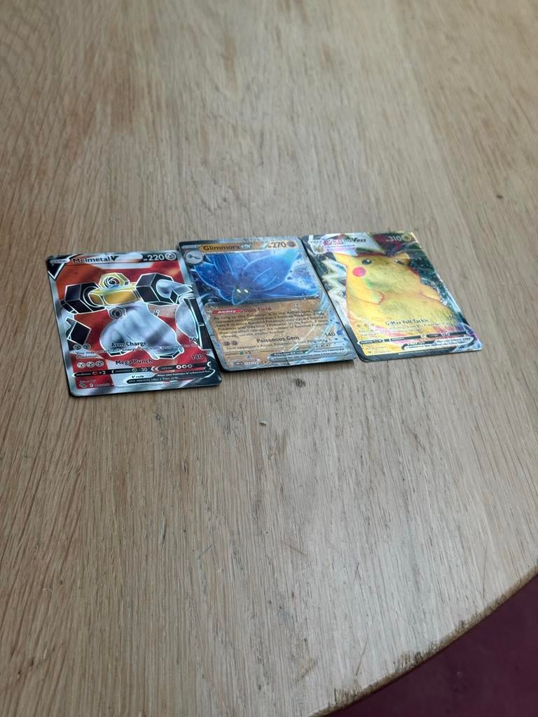 Pokemon Kaarten - Melmetal, Glimmora, Pikachu VMAX, Ophalen of Verzenden, Zo goed als nieuw, Losse kaart