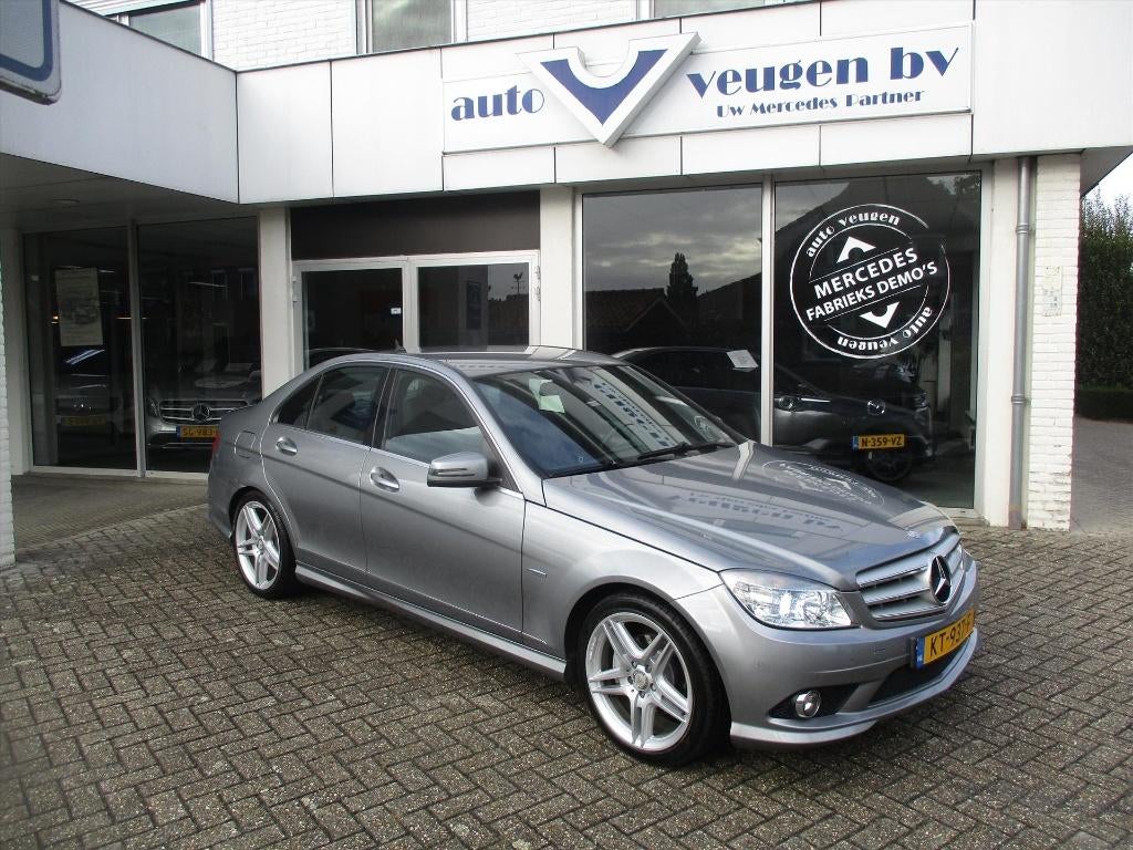 Mercedes-Benz C-Klasse 1.6 C180 Kompr. Sedan AMG 2009 Grijs, Auto's, Mercedes-Benz, Zwart, Met garantie (alle), Leder en Stof