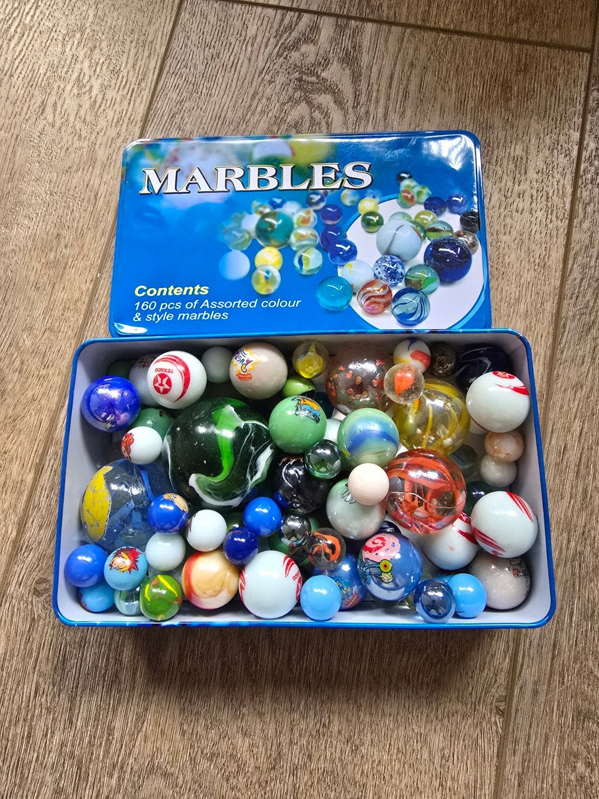 Te koop metalen blik met knikkers in verschillende kleuren e, Kinderen en Baby's, Ophalen of Verzenden, Nieuw, Jongen of Meisje