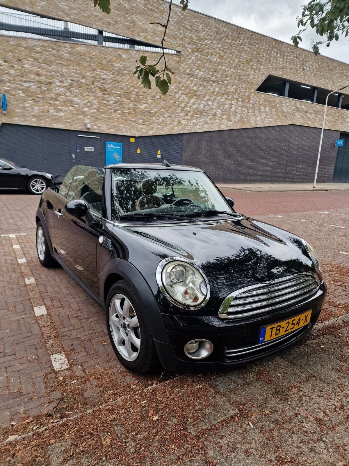 Mini 1.6 Cooper Cabrio 2009 Zwart, Auto's, Mini, 4 cilinders, Cabriolet, 4 stoelen, Handgeschakeld