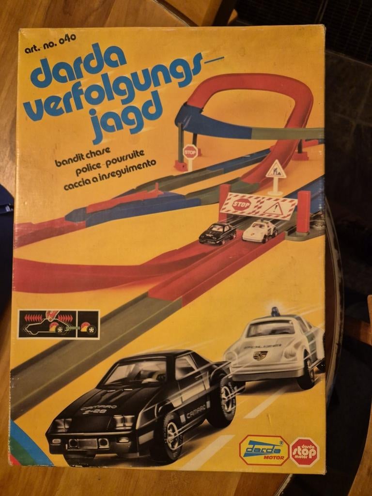 Darda Verfolgungsjagd Racebaan - Compleet met auto's, Overige merken, Zelf te bouwen, Opwindmechanisme, Ophalen of Verzenden