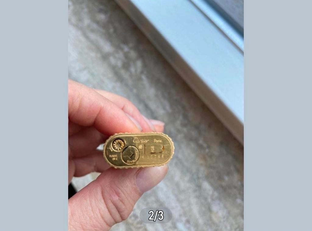 Te koop : Cartier Paris Aansteker Goudkleurig., Sieraden, Tassen en Uiterlijk, Ringen, Ophalen of Verzenden, Zo goed als nieuw
