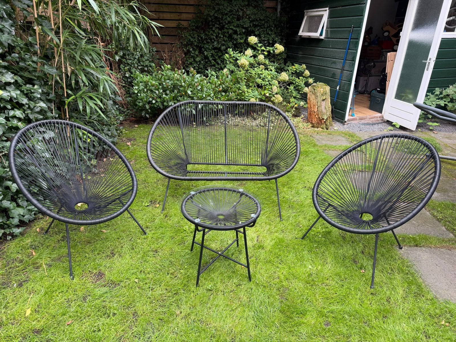 Complete zwarte Acapulco loungeset – 2 stoelen, bank & tafel