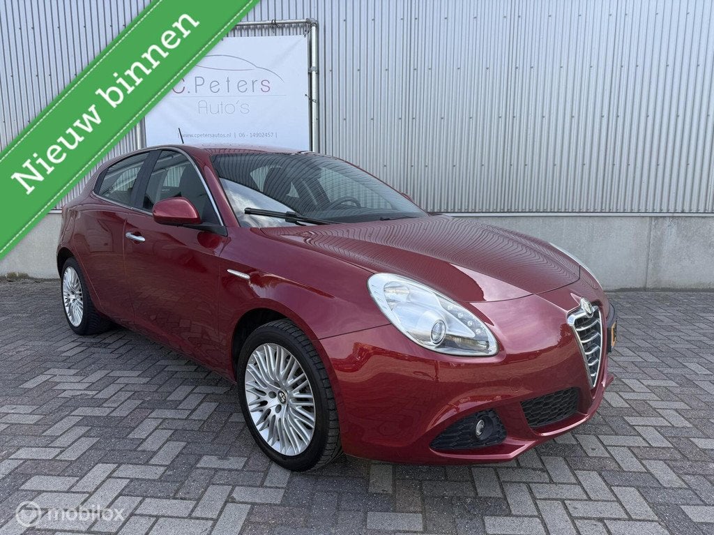 Alfa Romeo Giulietta 1.4 T Distinctive Automaat 2012 / Clima, Auto's, Alfa Romeo, Euro 5, Stof, 4 cilinders, Bedrijf