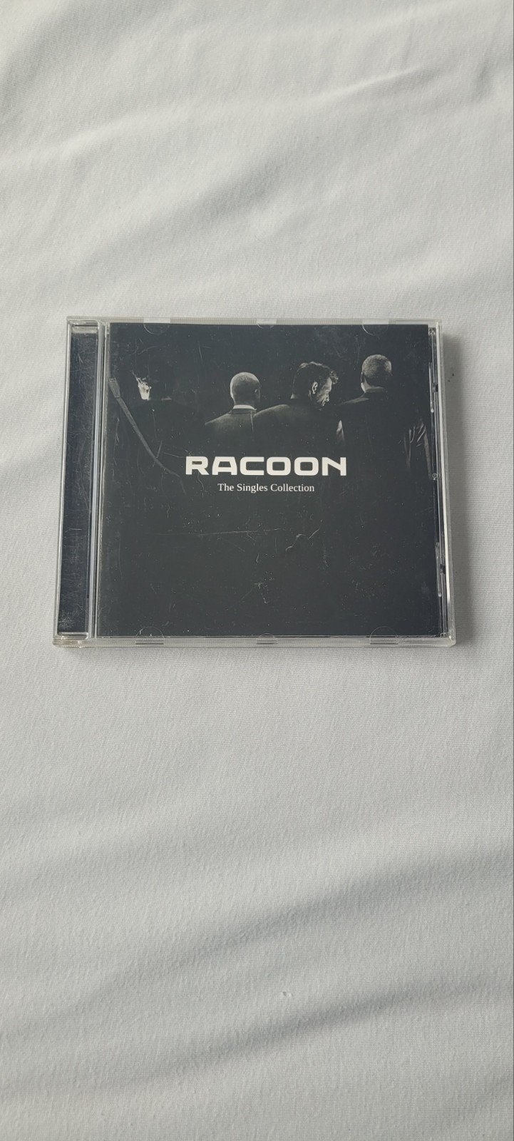 Raccoon - The Singles Collection CD, Gebruikt, Pop, Ophalen of Verzenden, Verzamelalbum