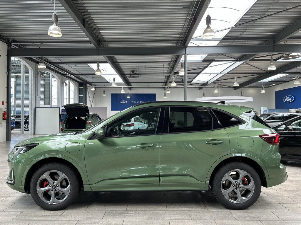 Ford Kuga 2.5 PHEV 243 pk ST-Line X | Trekhaak I AGR stoelen, Auto's, Ford, 12 maanden, 14 kWh, Gebruikt, Zwart