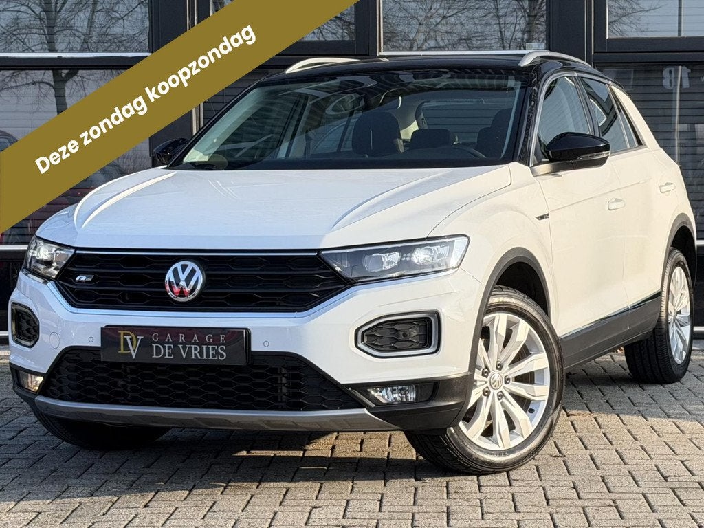 Volkswagen T-Roc 1.5 TSI Sport Business DSG R-Line ACC CarPl, Auto's, Volkswagen, Zwart, 4 cilinders, 150 pk, Leder en Stof