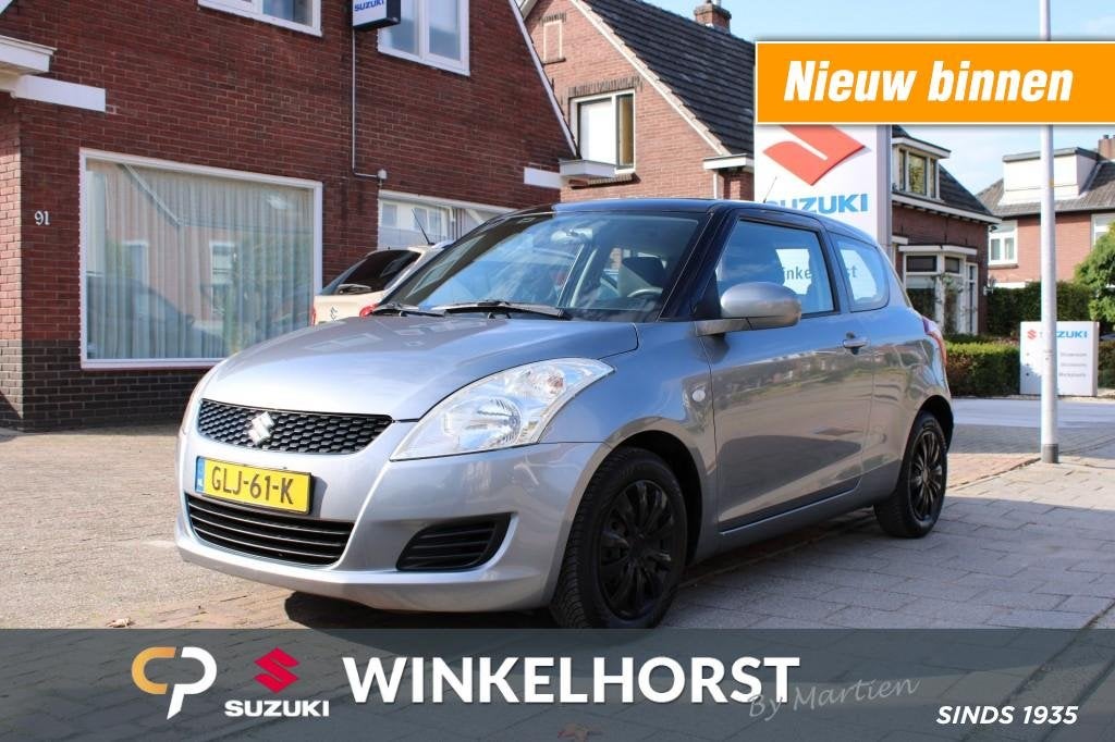 Suzuki SWIFT 1.2 COMFORT / AIRCO / RIJKLAARPRIJS, Auto's, Voorwielaandrijving, Gebruikt, Met garantie (alle), 400 kg