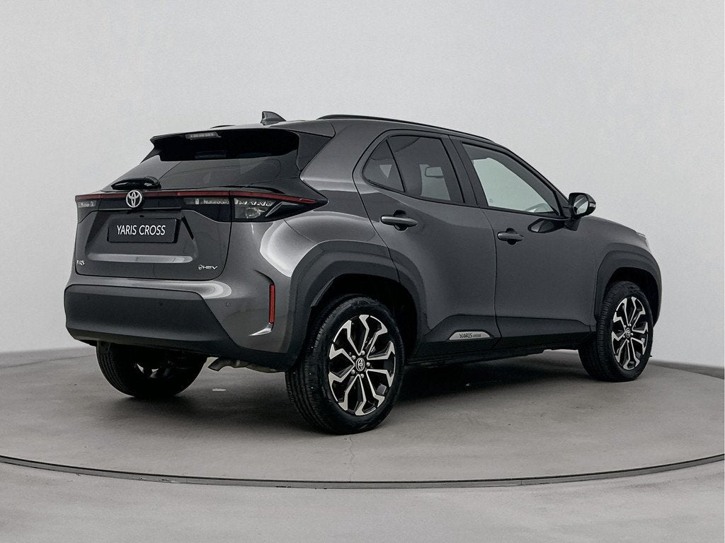 Toyota Yaris Cross 1.5 Hybrid 115 Dynamic Limited *NIEUW* |, Auto's, Stof, Zwart, 116 pk, 1490 cc