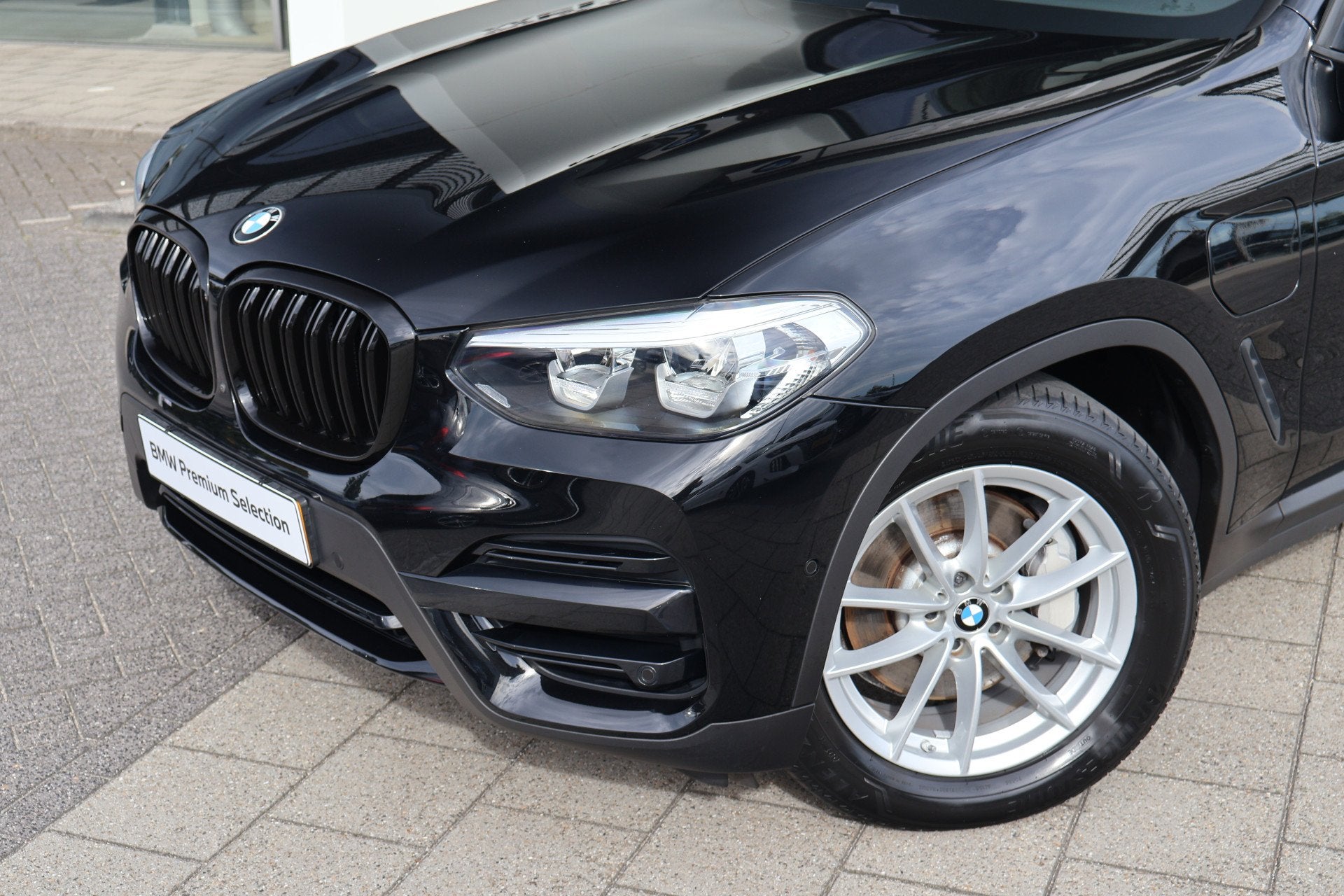 BMW X3 xDrive30e Essential Automaat / Trekhaak / Sportstoele, Auto's, Gebruikt, Euro 6, 4 cilinders, Leder en Stof