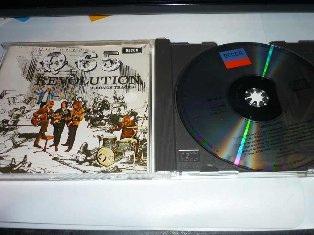 Q65 - Revolution CD (met 6 bonustracks), Cd's en Dvd's, Met bonustracks, Ophalen of Verzenden, Zo goed als nieuw, Psychedelic Rock