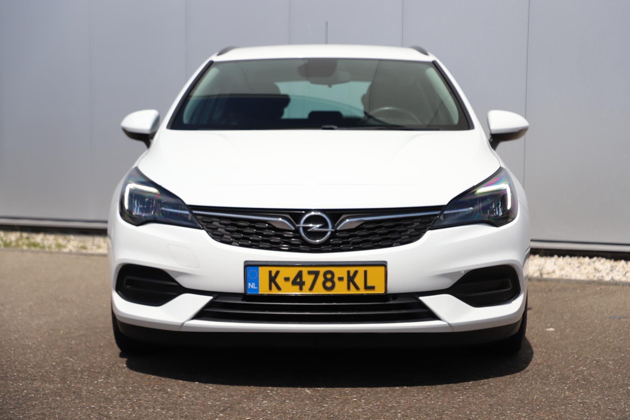 Opel Astra Sports Tourer 1.2 Edition 110PK Trekhaak Navigati, Auto's, Voorwielaandrijving, Stof, Gebruikt, 1199 cc