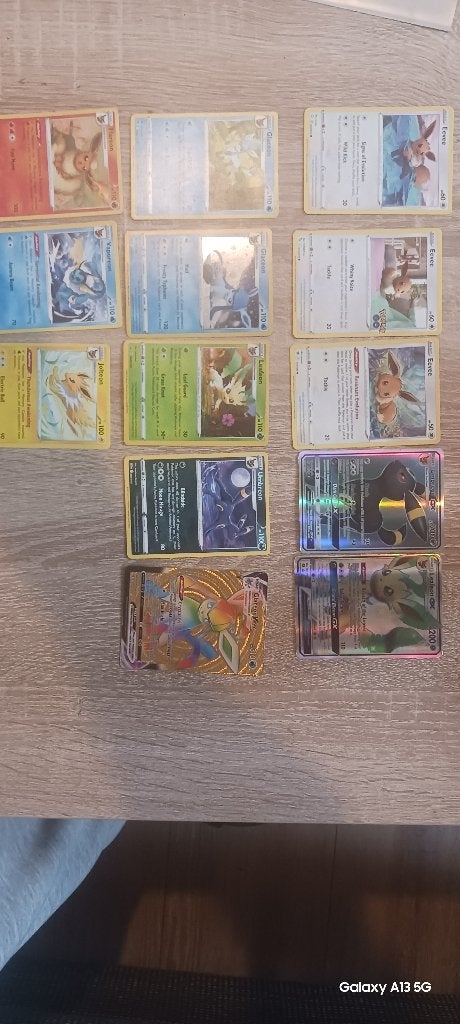 Eevee collectie+ revolutie, Ophalen of Verzenden, Zo goed als nieuw, Meerdere kaarten, Foil