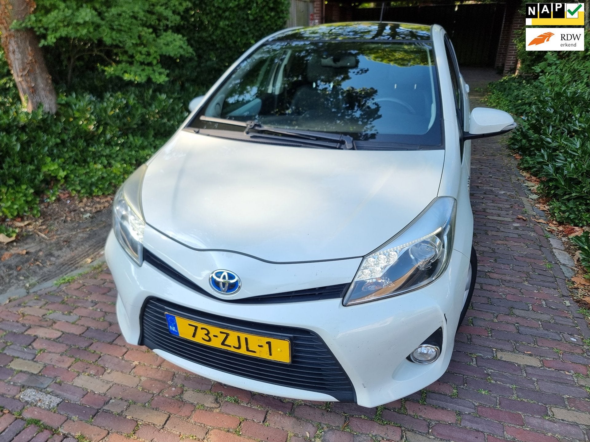 Toyota Yaris 1.5 Full Hybrid Dynamic Pano/Navi/Half leder, Auto's, Toyota, Euro 5, 1497 cc, Gebruikt, 4 cilinders