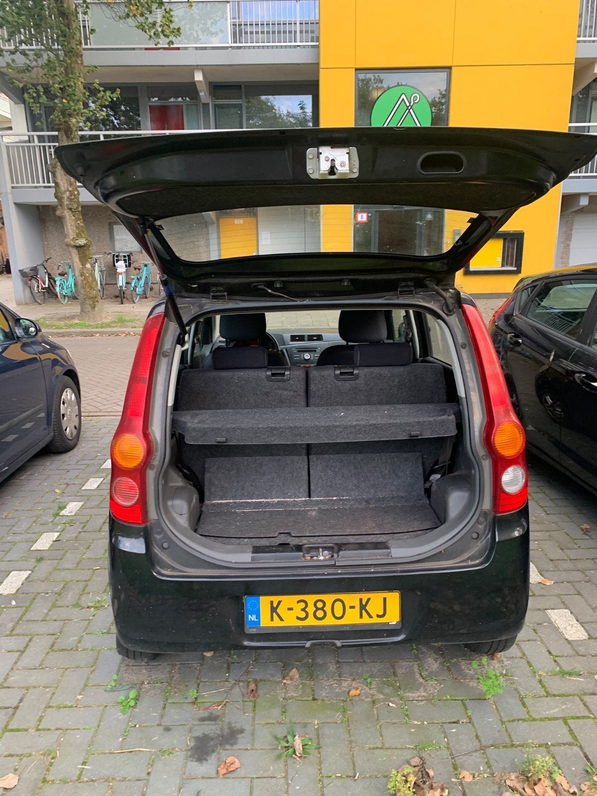 Daihatsu Cuore 1.0 5D 2009 Zwart, Auto's, Voorwielaandrijving, 600 kg, 18 €/maand, 4 stoelen