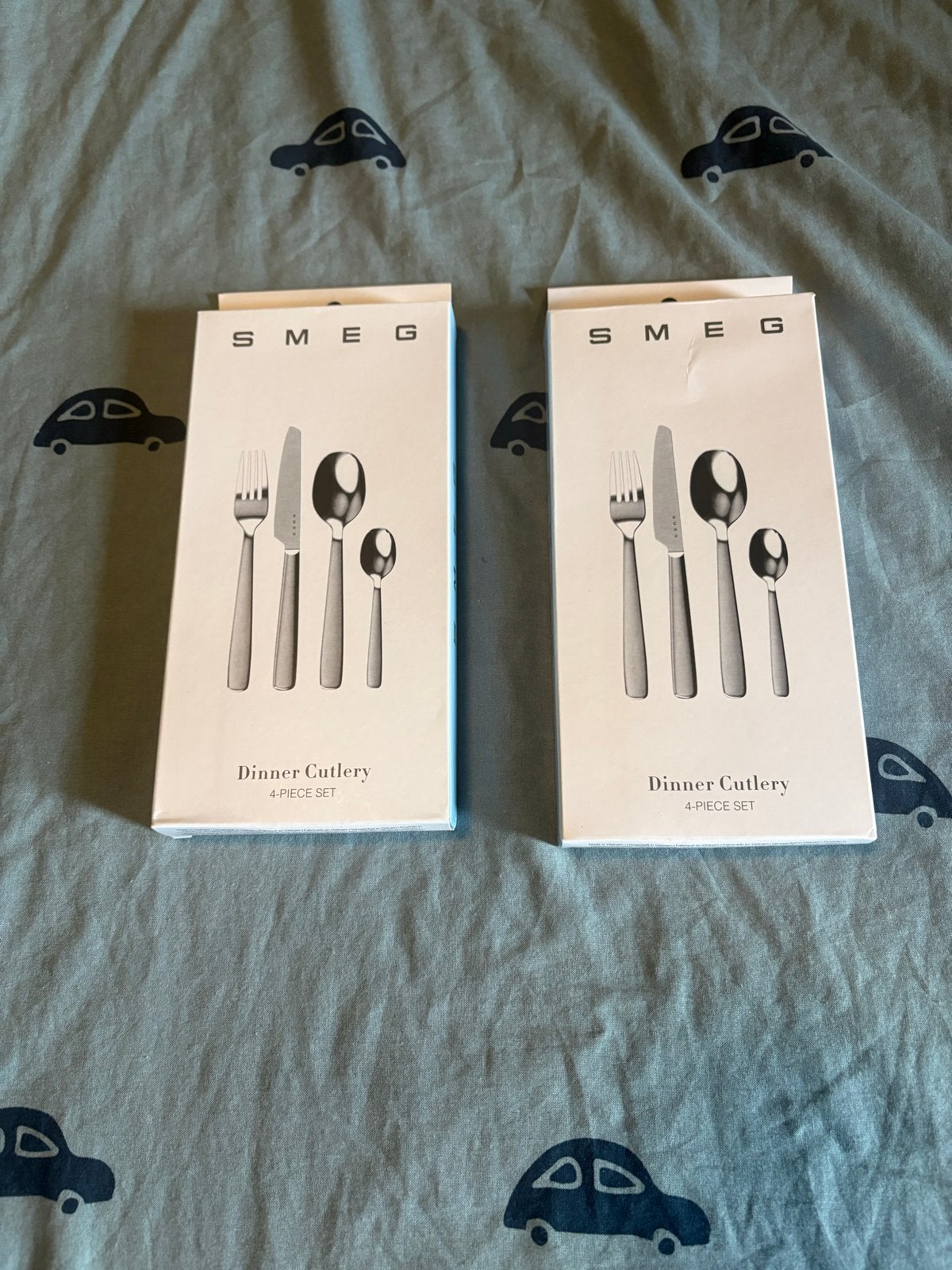 Smeg Bestekset - 2x 4-delige set - Nieuw in verpakking, Bestekset, Nieuw, Ophalen of Verzenden, Rvs of Chroom