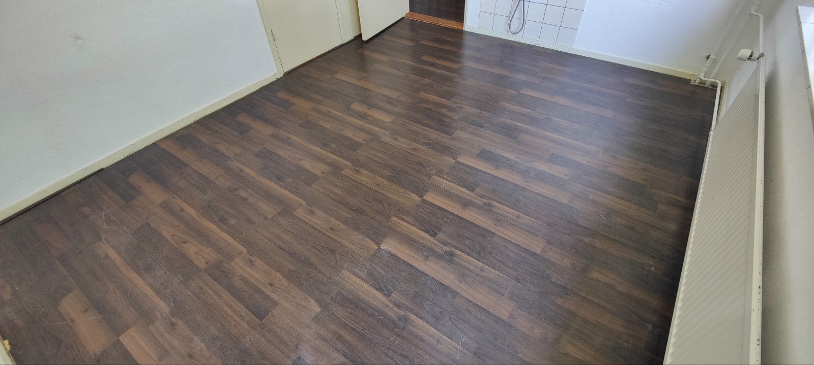 Donkerbruin laminaat, Ophalen, 50 tot 150 cm, Zo goed als nieuw, 10 m² of meer