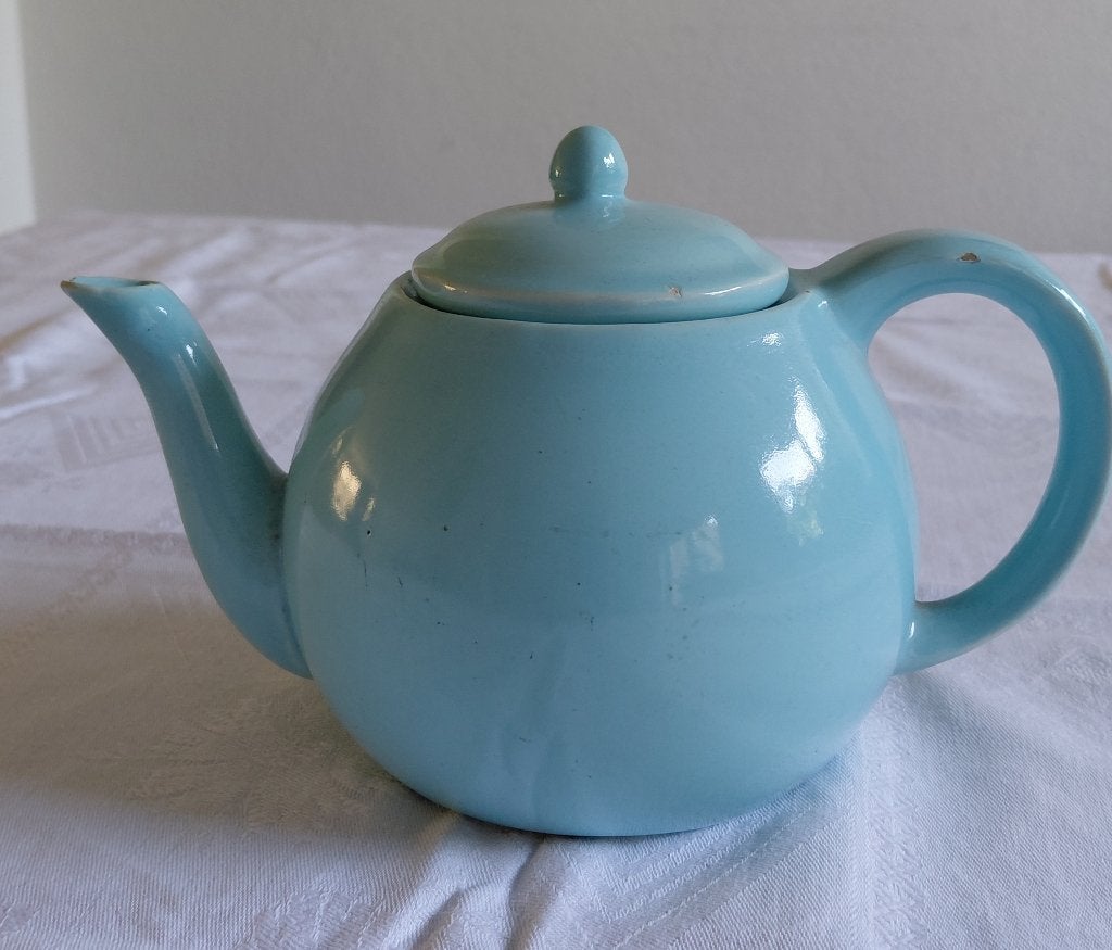 Blauwe vintage theepot, Ophalen