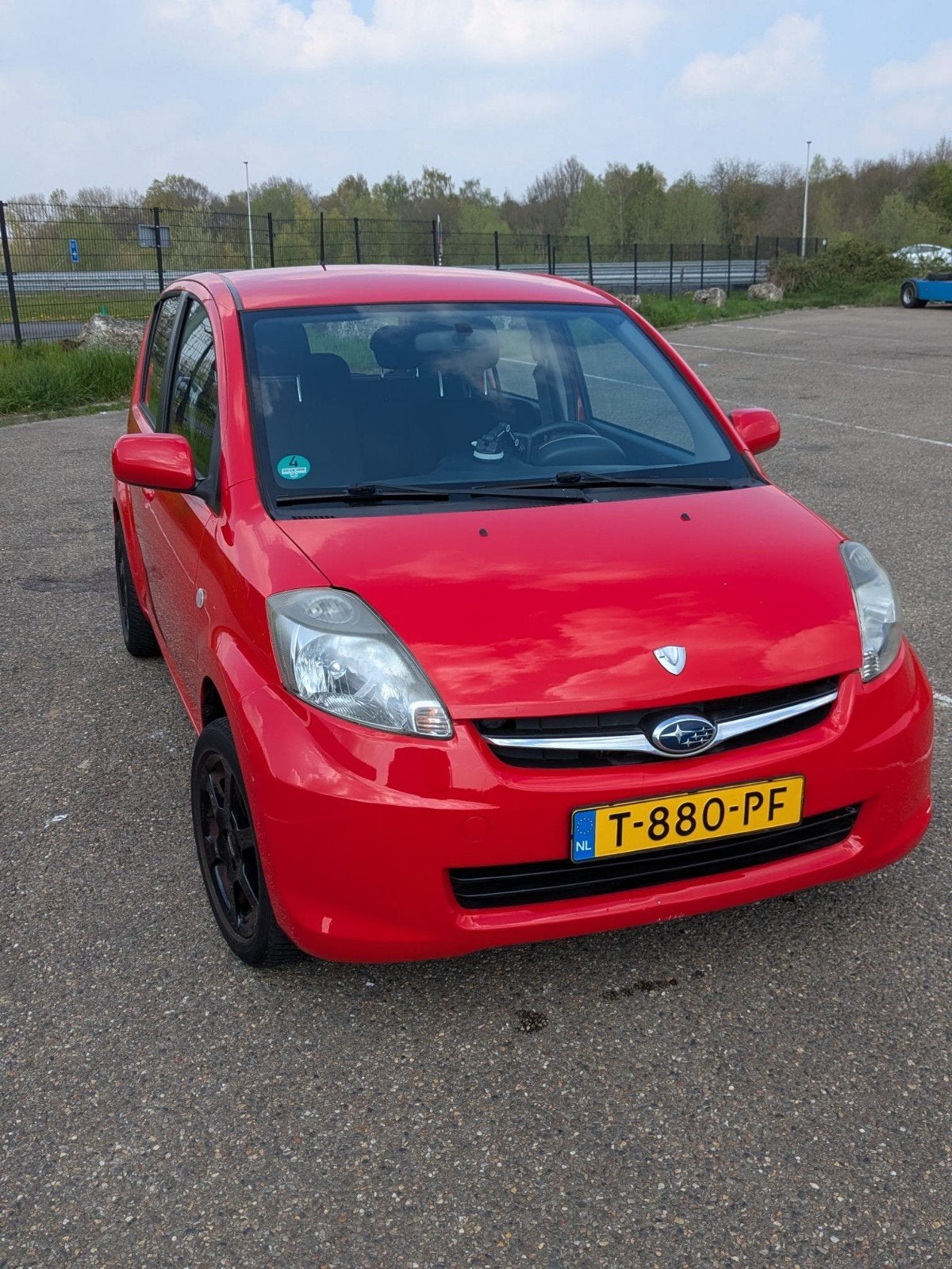 Subaru Justy 1.0 2010 Rood, Auto's, Voorwielaandrijving, Justy, Stof, Handgeschakeld