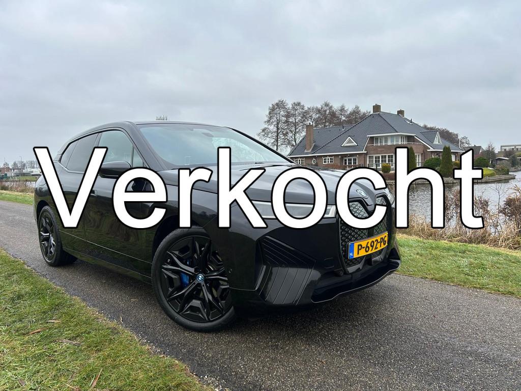 BMW iX xDrive40 High Executive 77 kWh Sportpakket / Panorama, Automaat, Gebruikt, Zwart, Zwart