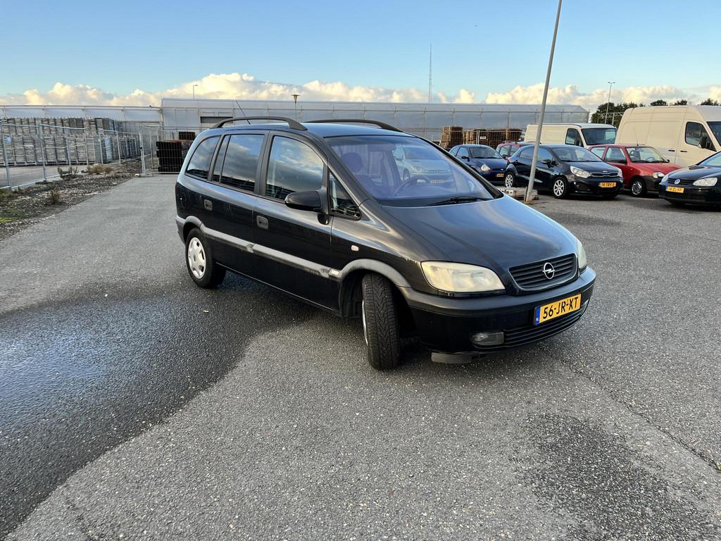Opel Zafira 1.6-16V Comfort, Auto's, Opel, Gebruikt, 4 cilinders, 7 stoelen, Zwart
