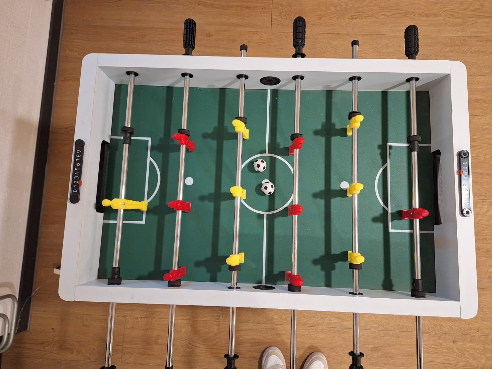Voetbaltafel, Ophalen