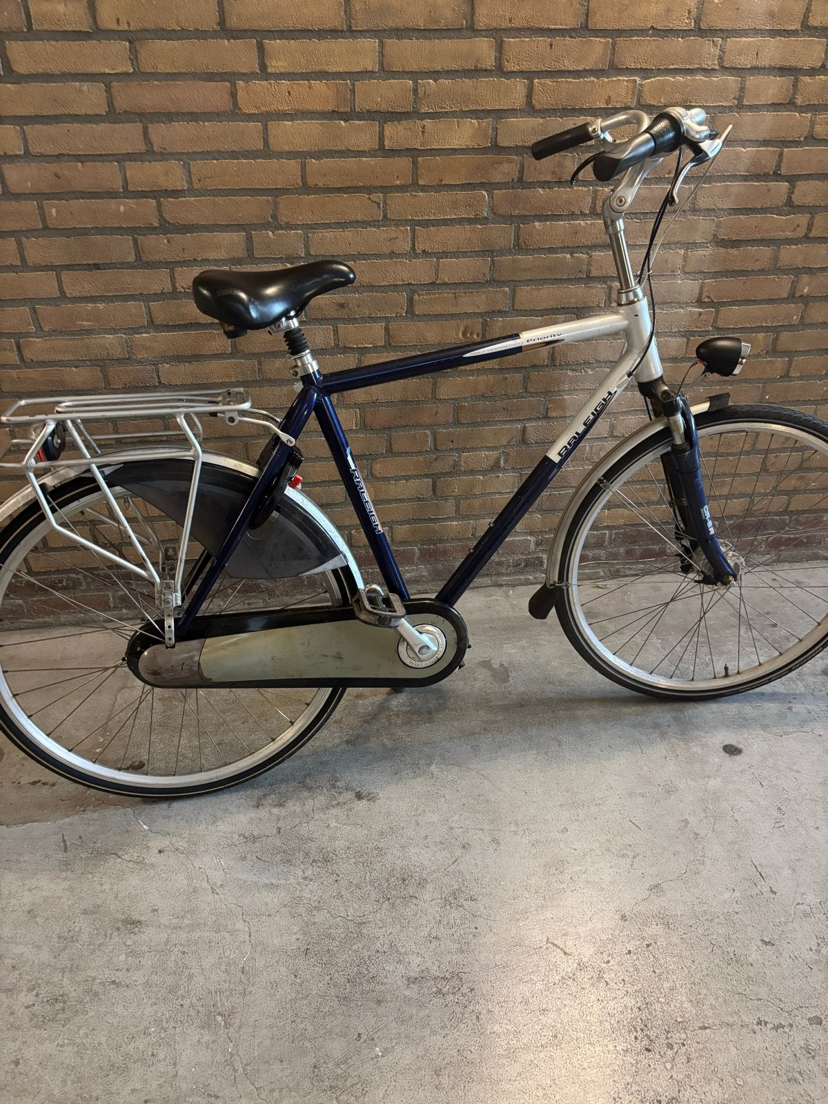 Raleigh Priority herenfiets, Fietsen en Brommers, Gebruikt, Velgrem, Versnellingen, 53 tot 57 cm