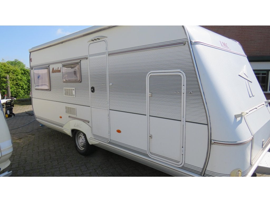 LMC MUNSTERLAND 530TK BJ 2003 STAPELBEDDEN VERKOCHT!!, Caravans en Kamperen, Caravans, Niet ingevuld, Dwarsbed, Rondzit, Bedrijf