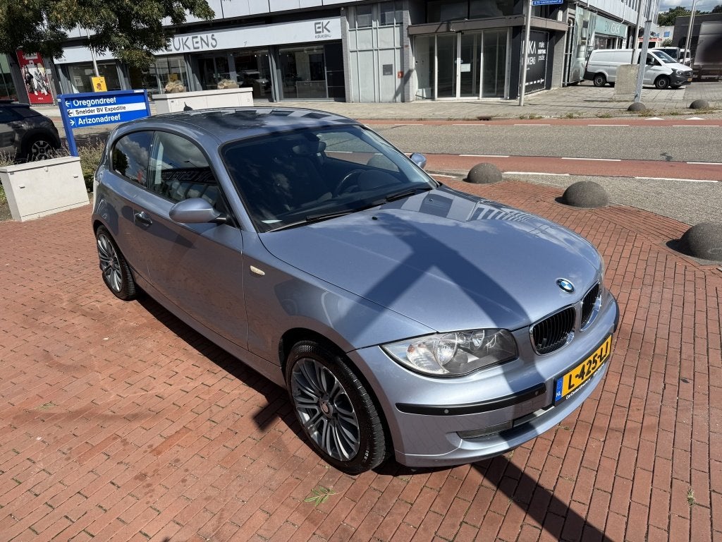 Foto 8 van BMW 1-serie 116i airco 6 versn navigatie 174dkm (bj 2009)