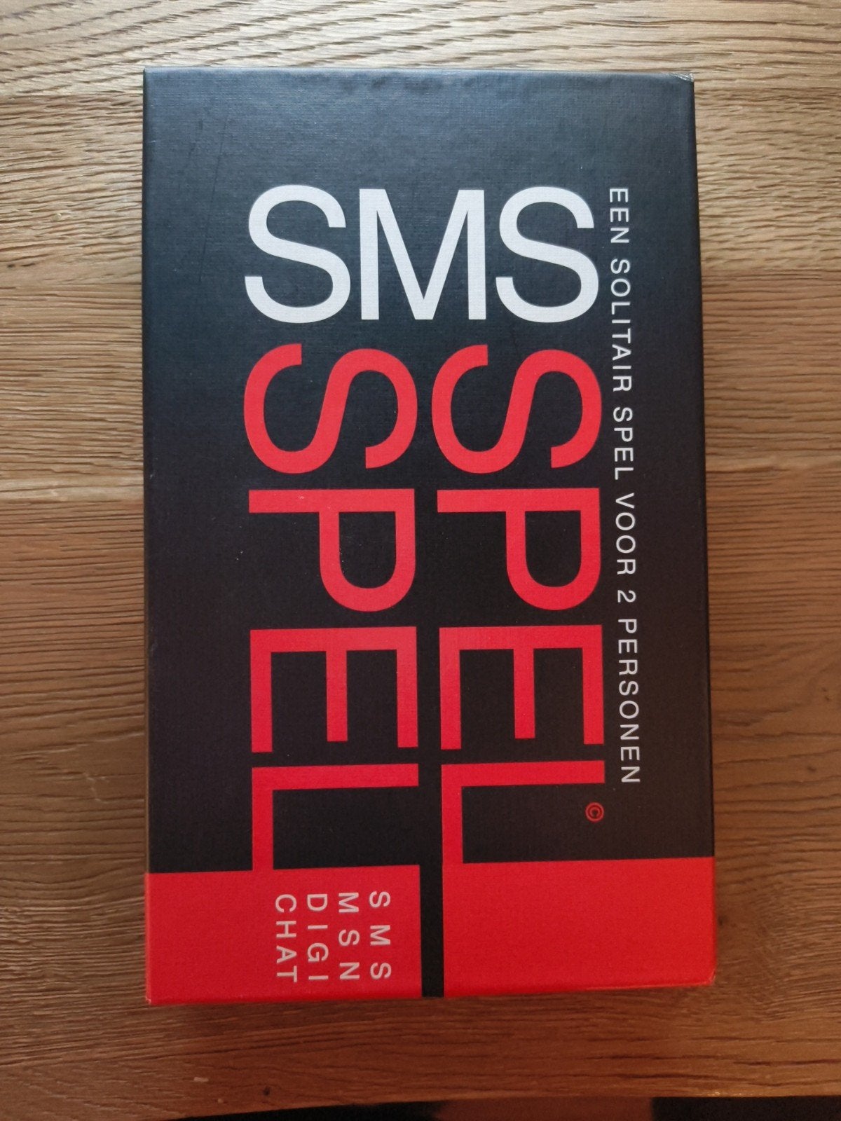 SMS Spel ZKWRDNBK - Bordspel met SMS-taal (nieuw), Een of twee spelers, Ophalen of Verzenden, Nieuw, Educos