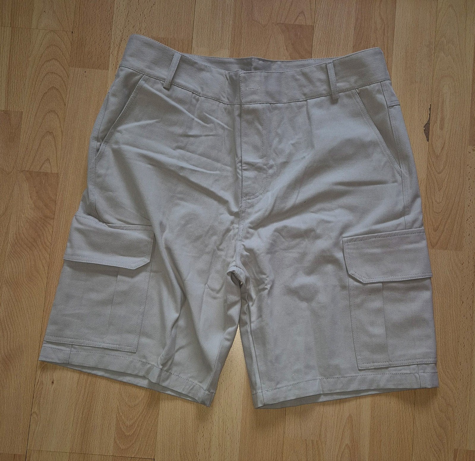 Nieuwe beige heren cargo korte broek - Maat L, Ophalen of Verzenden, Nieuw, Maat 52/54 (L), Beige