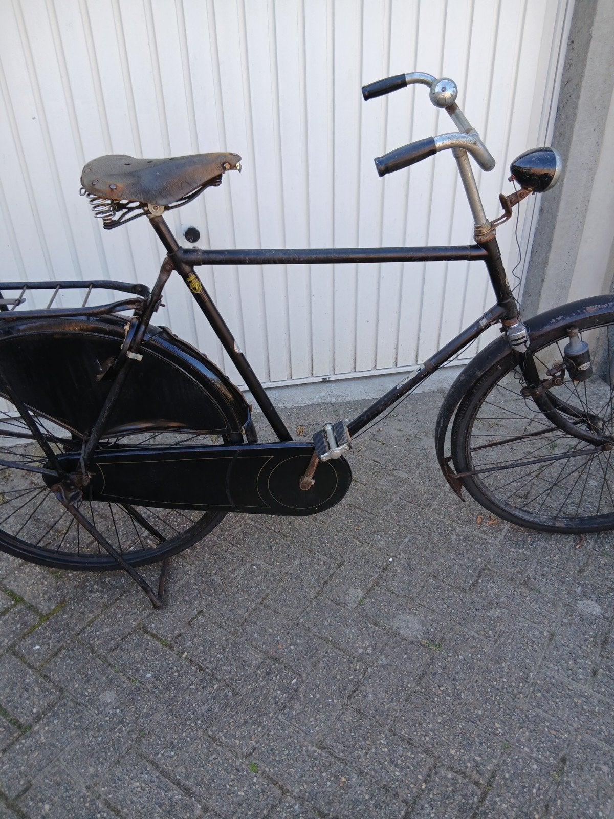 Bijna 100 jaar oude werkende KLM fiets, Ophalen