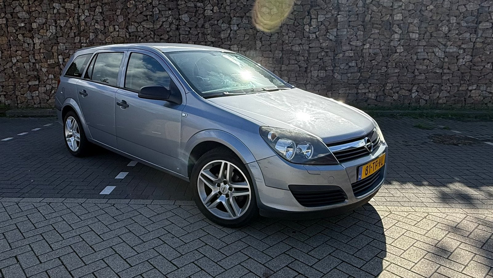 Opel Astra 1.6 16V St.wgn. 2006 Grijs/ LAGE KM NAP/ 5Deurs/, Auto's, Voorwielaandrijving, 15 km/l, 4 cilinders, Origineel Nederlands