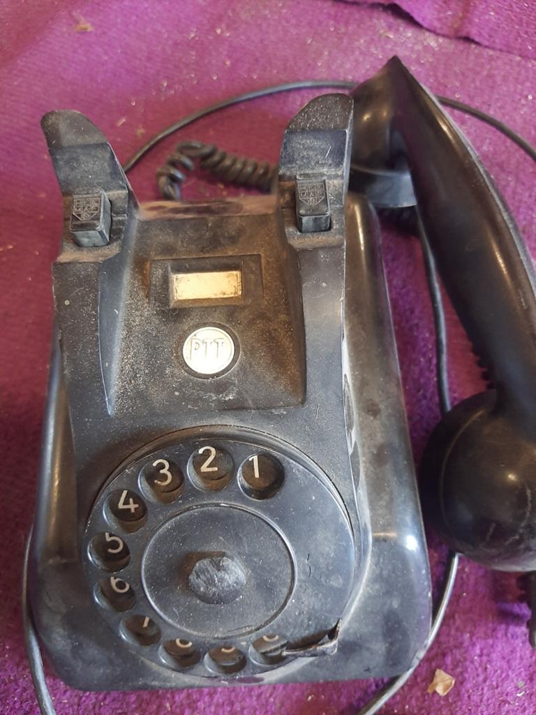 Antieke bakelieten telefoon, Ophalen
