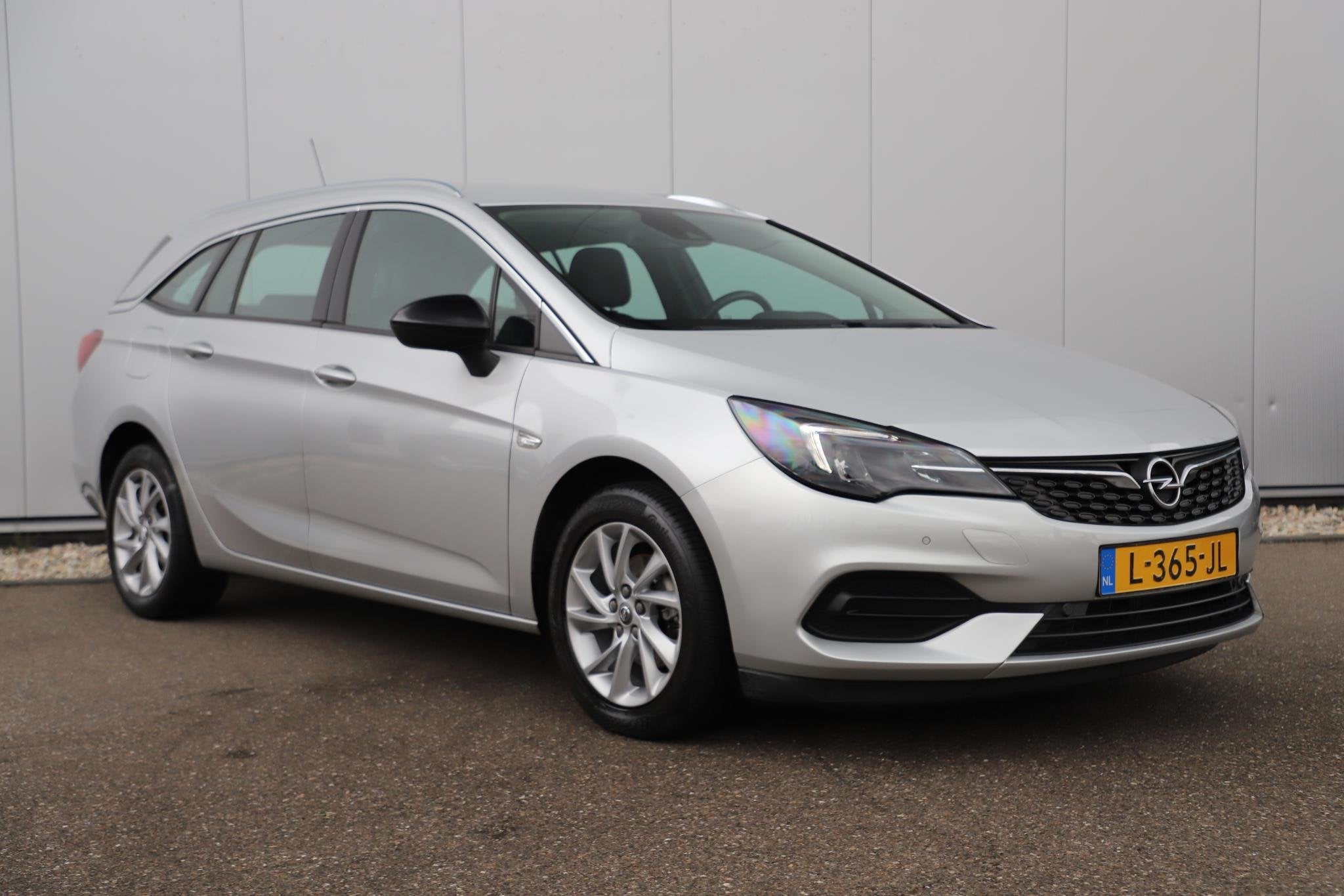 Opel Astra Sports Tourer 1.2 Business Elegance 131PK 16 inch, Auto's, Stof, 1199 cc, Met garantie (alle), Origineel Nederlands