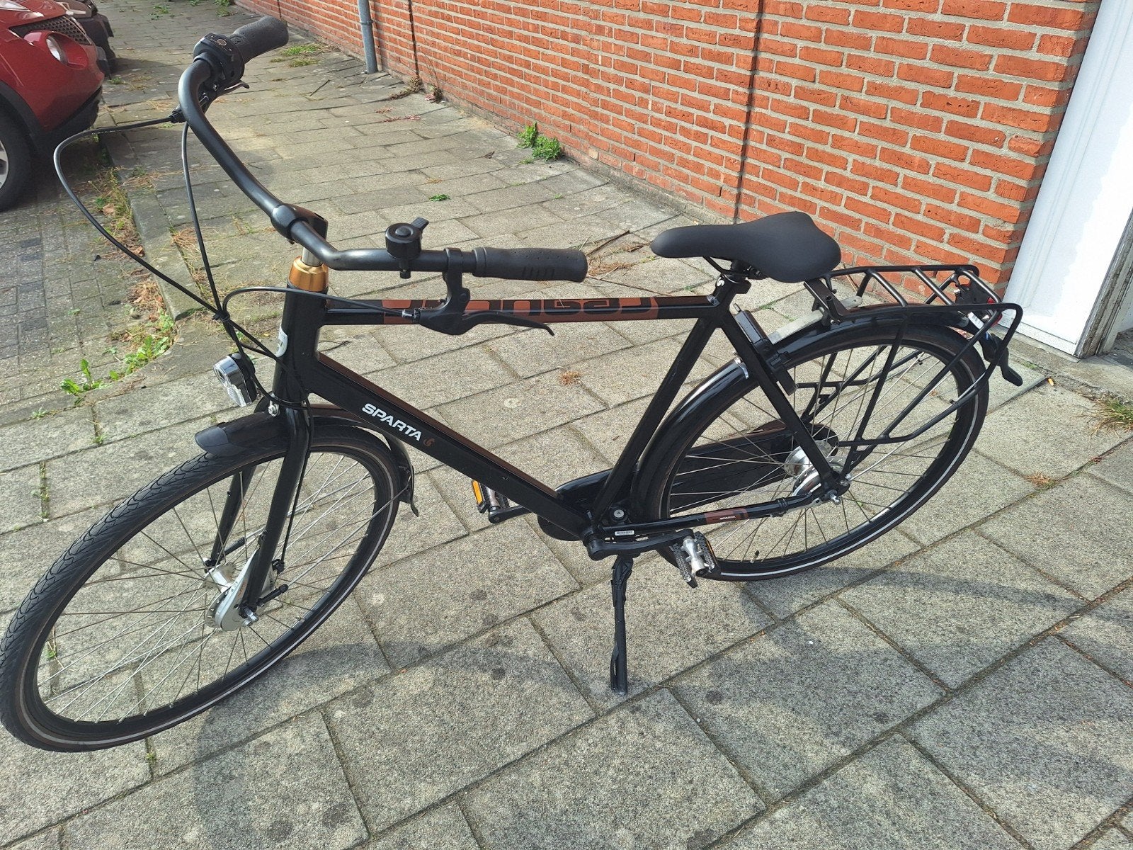 Sparta Regulair 57cm, Gebruikt, Ophalen, 26 inch of meer, Handrem