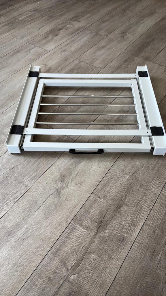 Wasmachine droger tussenstuk, Ophalen
