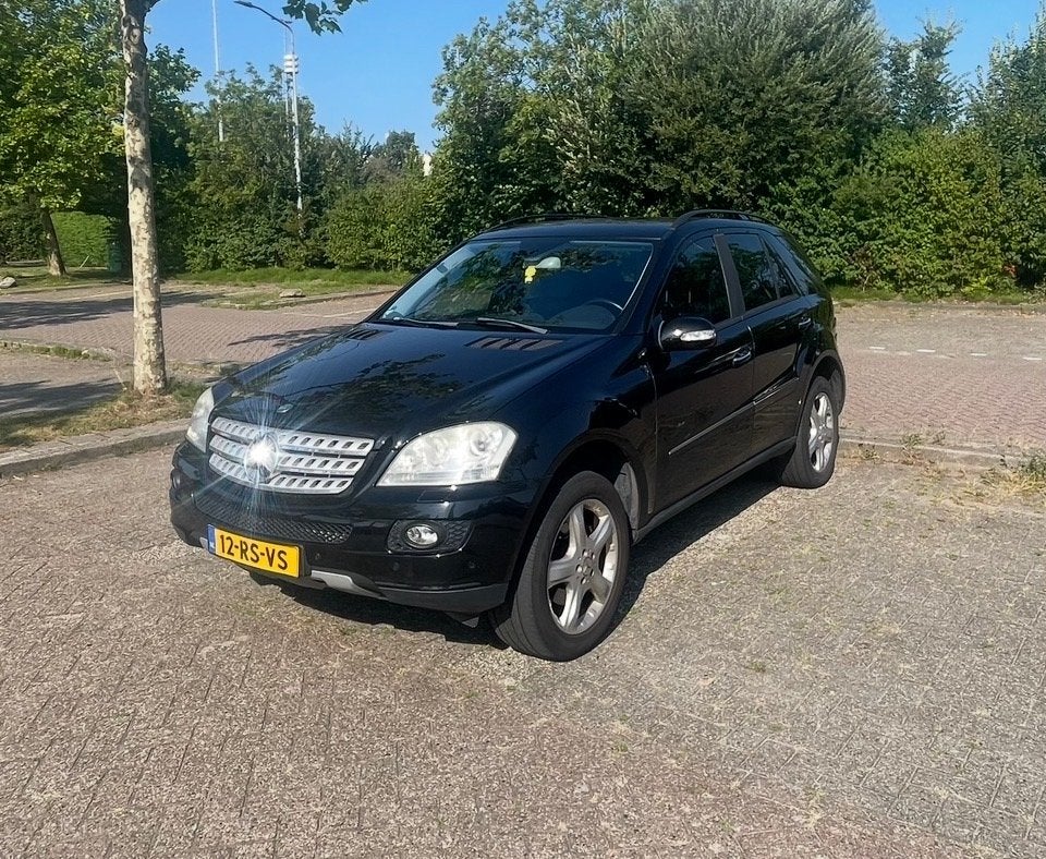Mercedes-Benz M-Klasse 3.5 Ml350 4MATIC AUT 2005 Zwart, Auto's, Automaat, Zwart, Origineel Nederlands, 272 pk