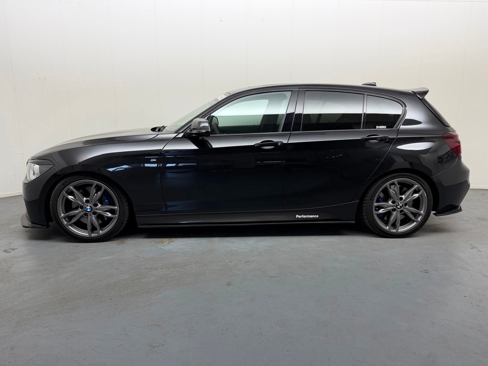 BMW 1-serie M135i xDrive High Executive # 420 PK # Remus uit, Euro 5, Gebruikt, 320 pk, Zwart