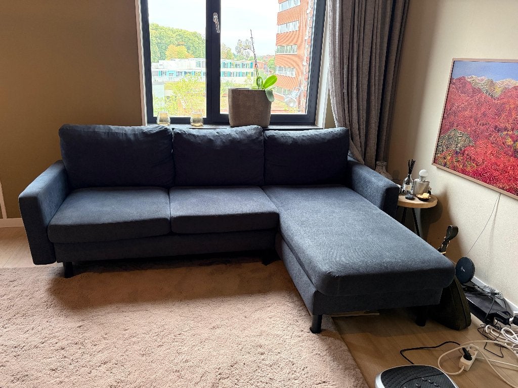 Comfortabele donkergrijze hoekbank met chaise longue, Huis en Inrichting, Banken | Bankstellen, Ophalen, Gebruikt, 125 tot 150 cm